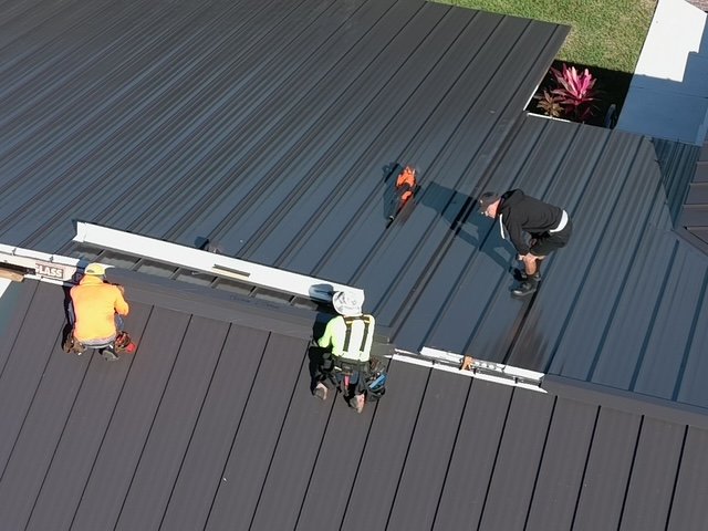 Slide of TNT Roofing