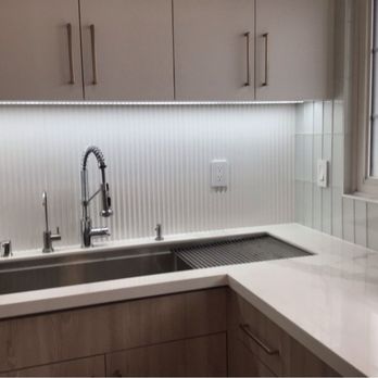 Divino Arc Design and Planning - Deep stainless steel sink with built in drainboar. - Interior Design Near Me