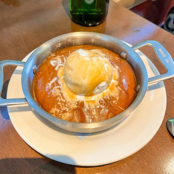Austin Oyster Co. - Sticky bread pudding with caramel and vanilla ice cream - Seafood Near Me - Austin, Texas Austin Oyster Co. - Sticky bread pudding with caramel and vanilla ice cream - Seafood Near Me - Austin, Texas