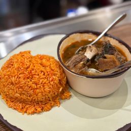 Oxtail pepper soup with jollof