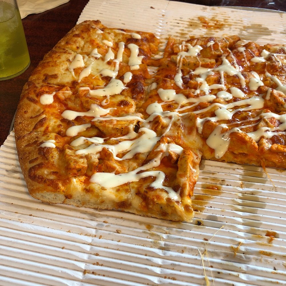 What's left of our 18" buffalo chicken pizza. We buy and add ranch! Yum! What's left of our 18" buffalo chicken pizza. We buy and add ranch! Yum!