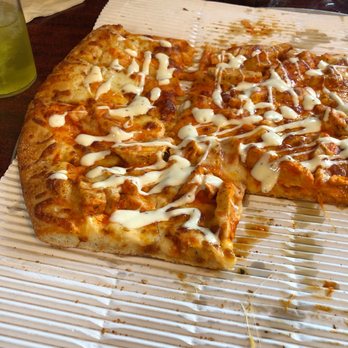 Colonial Pizza - What's left of our 18" buffalo chicken pizza. We buy and add ranch! Yum! - Pizza Near Me - Cedarville, Ohio