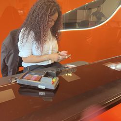 Sixt - As I walked back by, she was outside smoking god awful cigarettes right by the entrance.  Manager needs to know this.