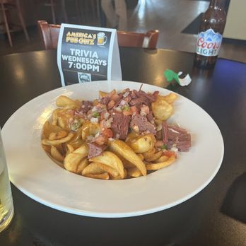 Belfast Station - Irish Nachos The menu said it was waffle fries but this is what we got - Irish Pub Near Me - Sussex, Wisconsin Belfast Station - Irish Nachos The menu said it was waffle fries but this is what we got - Irish Pub Near Me - Sussex, Wisconsin
