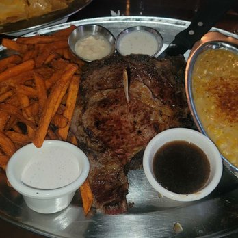 Saddle Ranch - Prime Rib with sweet potato fries & cream corn. - Steakhouses Near Me - Orange, California Saddle Ranch - Prime Rib with sweet potato fries & cream corn. - Steakhouses Near Me - Orange, California