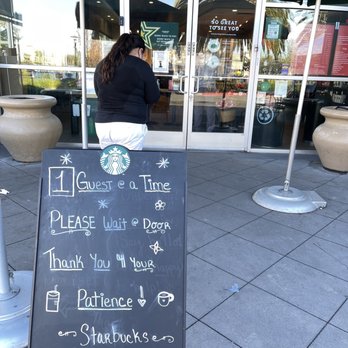 Starbucks - Umbrellas to cover customers during rainy days. All they need now are some outdoor heat lamps! - Coffee & Tea Near Me - San Jose, California