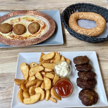 La Femme - Hummus with falafel, kofte with fries, and simit - Cafes Near Me - Berlin, BE La Femme - Hummus with falafel, kofte with fries, and simit - Cafes Near Me - Berlin, BE