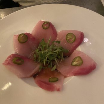 O-Ku - Yellowtail Serrano carpaccio. Also very delicious; we ordered this twice. The truffle profile goes so well with the fish. - Sushi Bars Near Me - Washington Dc, District of Columbia O-Ku - Yellowtail Serrano carpaccio. Also very delicious; we ordered this twice. The truffle profile goes so well with the fish. - Sushi Bars Near Me - Washington Dc, District of Columbia