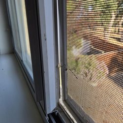 Window Screen Solutions And More - Huge gap and paper clip holding frame in window