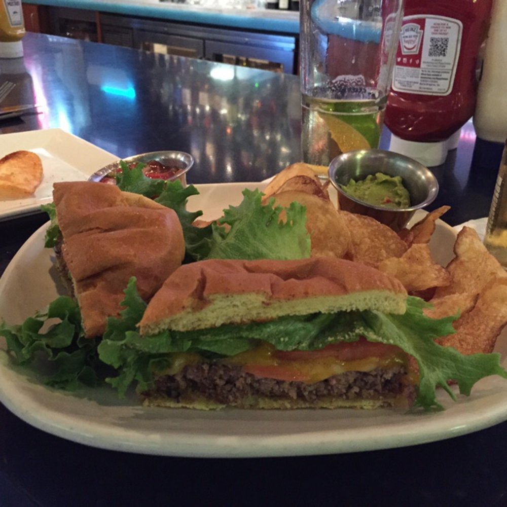 Corona Beach House - decent burger. Pair it with the cold beers, the tvs, and Doc the bartender and it's a nice place to wait for a flight - American Near Me - Miami, Florida Corona Beach House - decent burger. Pair it with the cold beers, the tvs, and Doc the bartender and it's a nice place to wait for a flight - American Near Me - Miami, Florida