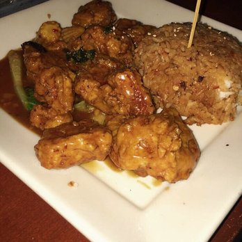 Yard House - Orange peel chicken and spicy rice - Bars Near Me - Roseville, California Yard House - Orange peel chicken and spicy rice - Bars Near Me - Roseville, California
