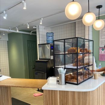 Blank Street Coffee - a man working behind a counter - Coffee & Tea Near Me - New York, New York Blank Street Coffee - a man working behind a counter - Coffee & Tea Near Me - New York, New York