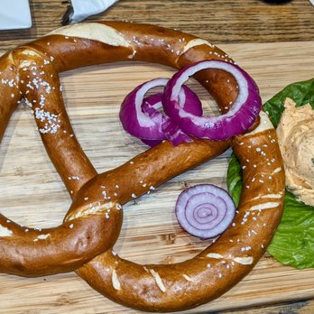 Max Bratwurst und Bier - Laugenbrezel Oktoberfest Style (giant pretzel) w.cheese spread $12 - German Near Me - Astoria, New York Max Bratwurst und Bier - Laugenbrezel Oktoberfest Style (giant pretzel) w.cheese spread $12 - German Near Me - Astoria, New York