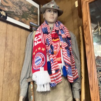 Blue Holler Cafe - Mannequin with Bayern München and American scarves - Cafes Near Me - Mammoth Cave, Kentucky