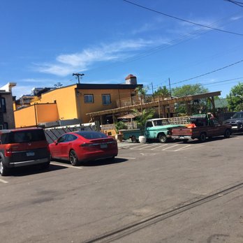 HAI HAI - Hai Hai parking lot and back patio - so sunny! - Vietnamese Near Me - Minneapolis, Minnesota