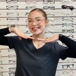 Central Oahu Eye Care - Fall in love with your next pair- shop the wall behind her!