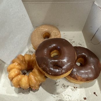 MX Donut - I ordered half a dozen but took this photo after we ate two already and I accidentally poked my finger into one. So good! - Donuts Near Me - Lathrop, California
