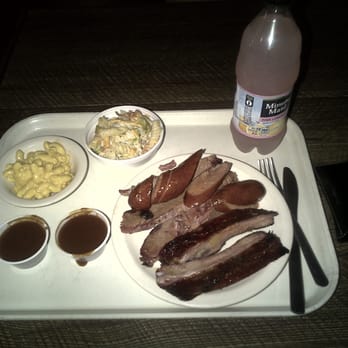 Bodacious Bar-B-Q - Meat platter with brisket, ribs, hot links with a side of bbq sauce, mac and cheese and pasta salad - Barbeque Near Me - Arlington, Texas