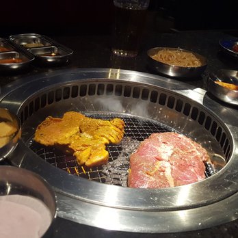 Iron Age - The ventilation can be seen just slightly above the cooking service which allows a smoke free experience. You won't smell Like BBQ! - Korean Near Me - Catonsville, Maryland Iron Age - The ventilation can be seen just slightly above the cooking service which allows a smoke free experience. You won't smell Like BBQ! - Korean Near Me - Catonsville, Maryland