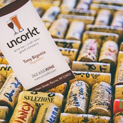 Uncorkt - Tony's business card in the cork bar top.