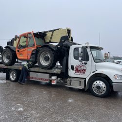 Lamb Towing & Recovery - Rollback Wrecker hauling equipment