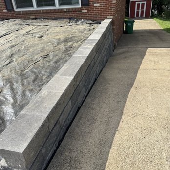 Reich Landscaping - After Reich Landscaping replaced the retaining wall. - Tree Services Near Me Reich Landscaping - After Reich Landscaping replaced the retaining wall. - Tree Services Near Me