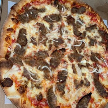 Pinocchio Pizza - Sausage and onion Pizza, delicious - Italian Near Me - New Canaan, Connecticut Pinocchio Pizza - Sausage and onion Pizza, delicious - Italian Near Me - New Canaan, Connecticut