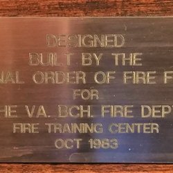 Virginia Beach Fire Training Center - This is the plaque above the case with the firefighter clothes (boots, etc,).  Photo taken March 20, 2018.