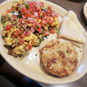 Snooze, an A.M. Eatery - Scramble with barbacoa beef, veggies, pico de gallo on top. Flour tortillas and has browns. SO YUMMY! - Breakfast & Brunch Near Me - Orange, California