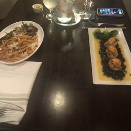 Pomme Frites Grilled Angus New York Strip and crabby scallops with black coconut rice Pomme Frites Grilled Angus New York Strip and crabby scallops with black coconut rice