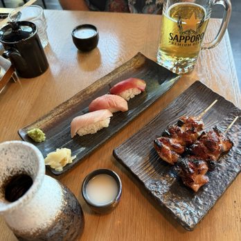 AFURI IZAKAYA - Tuna trio, sake, Sapporo & chicken thigh skewers, yumm!! - Ramen Near Me - Portland, Oregon