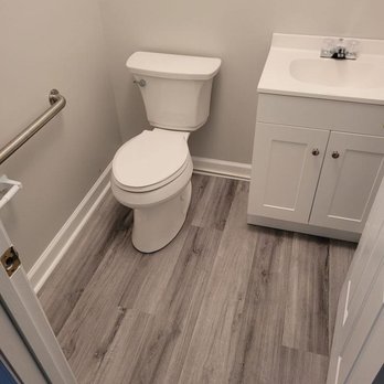 D- - a toilet and sink in a small bathroom - Electricians Near Me - Hartsville, South Carolina D- - a toilet and sink in a small bathroom - Electricians Near Me - Hartsville, South Carolina