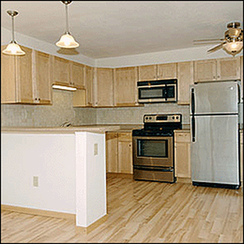 OC Carpet & More - a kitchen with wood floors - Flooring Near Me - Lake Forest, California OC Carpet & More - a kitchen with wood floors - Flooring Near Me - Lake Forest, California