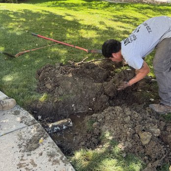 A3 in 1 Irrigation Specialist - Getting ready to lay more pvc pipe that will have a thing at the end so the water can escape to the yard, but the roots can't enter the pipe - Irrigation Near Me - Denver, Colorado