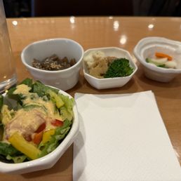 Little dishes of pickles and salad Little dishes of pickles and salad