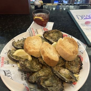 Drago’s Seafood Restaurant - Charred Oysters  and bread, - Seafood Near Me - Baton Rouge, Louisiana