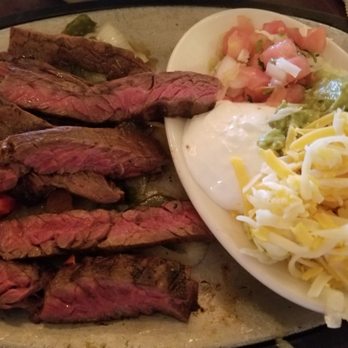 Uncle Julio's - Fajita skirt steak cooked medium rare - Mexican Near Me - Gaithersburg, Maryland Uncle Julio's - Fajita skirt steak cooked medium rare - Mexican Near Me - Gaithersburg, Maryland