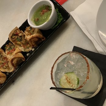 By Popular Demand - Tasty Egg rolls and the green sauce added more flavor - Whiskey Bars Near Me - Houston, Texas
