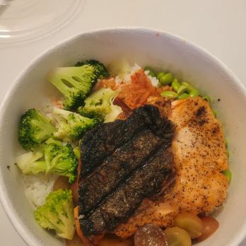 Marinate Korean BBQ - Salmon Rice Bowl with salmon, white rice, broccoli, kimchi, grapes, and edamame - Korean Near Me - Long Beach, California Marinate Korean BBQ - Salmon Rice Bowl with salmon, white rice, broccoli, kimchi, grapes, and edamame - Korean Near Me - Long Beach, California