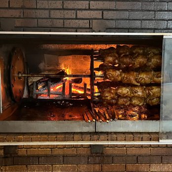 Cowboy Chicken - roasting chicken in a brick oven - Southern Near Me - Frisco, Texas