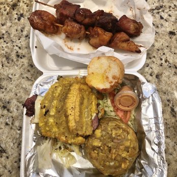 Willie's Pinchos in Orlando - To go order of chicken and pork skewers, and a Jibaritos sandwich with a side of mofongo. - Puerto Rican Near Me - Orlando, Florida
