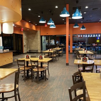 Toasted - UCF Area - tables and chairs in a restaurant - Burgers Near Me - Orlando, Florida