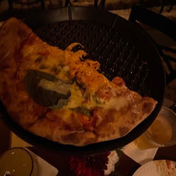 Johnny's Saloon - 1/2 a pizza because it's that good!!!  Not finished yet!  Compliment it with a Don Rickles, Old Fashioned or a Stella! - Dive Bars Near Me - Huntington Beach, California