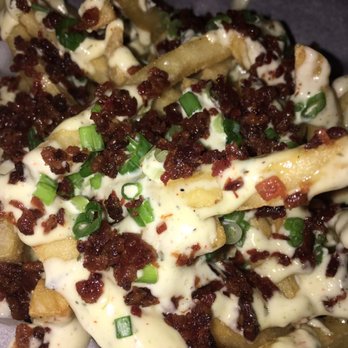 Berry Park - Close up of park fries and bacon - New American Near Me - Brooklyn, New York Berry Park - Close up of park fries and bacon - New American Near Me - Brooklyn, New York