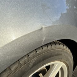 Budget Car Rental - One of many dents...