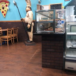 a statue of a chef a statue of a chef