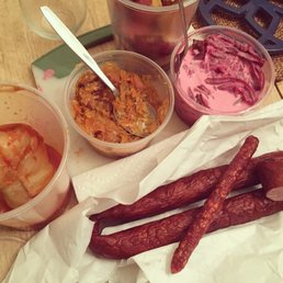 Polish Pork Store delicacies: golabki, sauteed onion & kielbasa, beet & herring salad, roast potato, smoked dry kielbasa, spicy kabanos