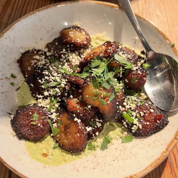 Corbu's Pizza - Fried plantains with spicy sorgum glaze, aji verde, cotija - Pizza Near Me - Atlanta, Georgia Corbu's Pizza - Fried plantains with spicy sorgum glaze, aji verde, cotija - Pizza Near Me - Atlanta, Georgia