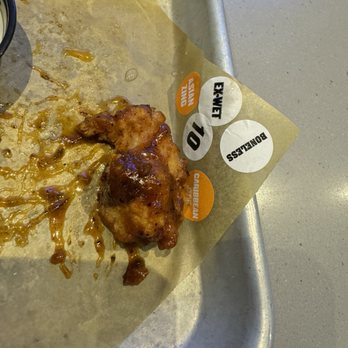 Buffalo Wild Wings - Notice the label, ex-wet. These were not. Barely have sauce on them. Any way to save a buck. - American Near Me - Gastonia, North Carolina Buffalo Wild Wings - Notice the label, ex-wet. These were not. Barely have sauce on them. Any way to save a buck. - American Near Me - Gastonia, North Carolina