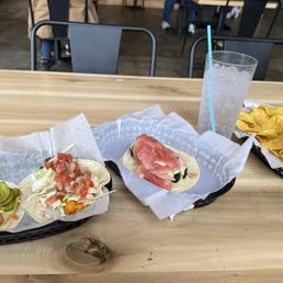 Fish tacos, Bangkok shrimp and pork belly taco and queso and chips, of course! Fish tacos, Bangkok shrimp and pork belly taco and queso and chips, of course!